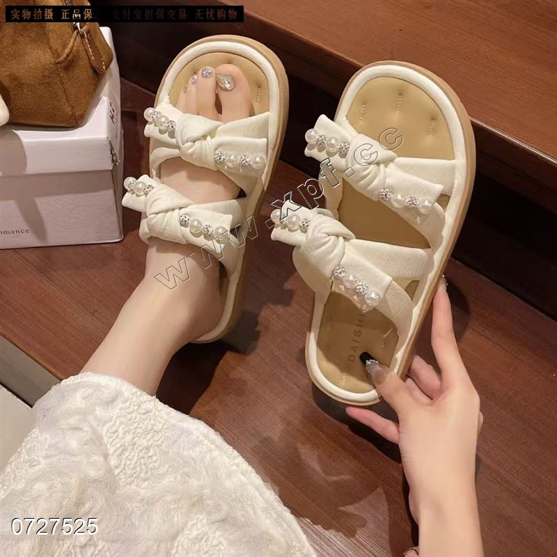 她瑟